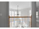 Open loft area with built-in shelving, large windows, and neutral paint at 7290 Weber St, Atlanta, GA 30349