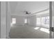 Spacious primary bedroom suite features tray ceilings and abundant natural light at 7290 Weber St, Atlanta, GA 30349
