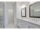 Bathroom boasts double sink, vanity, and a glass shower at 1115 Larkin Dr, Buford, GA 30518