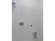 Empty laundry room with utility shelf and washer/dryer hookups at 1115 Larkin Dr, Buford, GA 30518