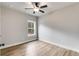 This bedroom offers natural light from its window and a modern ceiling fan at 286 Old Yorkville Rd, Dallas, GA 30157