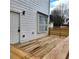Backyard features a wood deck and siding with a view to the backyard at 2413 Charleston Pointe Ct, Atlanta, GA 30316