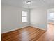 Bedroom with wood floors, natural light, and neutral walls at 2413 Charleston Pointe Ct, Atlanta, GA 30316