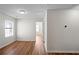 Bedroom with wood floors, natural light, and neutral walls at 2413 Charleston Pointe Ct, Atlanta, GA 30316