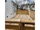 Exterior deck with wooden rails and residential view at 2413 Charleston Pointe Ct, Atlanta, GA 30316