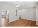 Bright dining area with wood floors and modern lighting at 2413 Charleston Pointe Ct, Atlanta, GA 30316