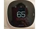 Ecobee Smart Thermostat showing the house is being held at a comfortable 65 degrees at 2413 Charleston Pointe Ct, Atlanta, GA 30316