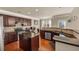 Well-appointed kitchen features wooden cabinets, granite countertops, and stainless steel appliances at 2468 Cannon Farm Ln, Duluth, GA 30097