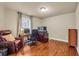 Bright office space with hardwood floors, desk, and comfortable leather chair at 2468 Cannon Farm Ln, Duluth, GA 30097