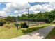 Well-maintained community tennis courts with a perimeter fence and manicured landscaping at 2468 Cannon Farm Ln, Duluth, GA 30097