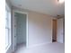 Bedroom with a large window and white trim at 5360 Memento Trce, Cumming, GA 30040