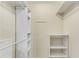 Walk-in closet with built-in shelving and rods for optimal storage at 1101 Collier Nw Rd # R3, Atlanta, GA 30318