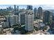 An aerial view of a high rise apartment building featuring a pool at 199 14Th Ne St # 2407, Atlanta, GA 30309
