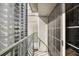 Private balcony with railing offering city views and natural light at 199 14Th Ne St # 2407, Atlanta, GA 30309