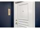 Apartment 2407 front entrance featuring a white door and blue wall at 199 14Th Ne St # 2407, Atlanta, GA 30309