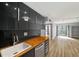 Modern kitchen boasts sleek cabinetry, stainless steel appliances, and butcher block countertops at 199 14Th Ne St # 2407, Atlanta, GA 30309