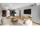 Bright living room with modern furnishings, wood floors, and open kitchen at 199 14Th Ne St # 2407, Atlanta, GA 30309