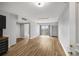 Spacious room with hardwood floors, balcony, and access to other rooms at 199 14Th Ne St # 2407, Atlanta, GA 30309
