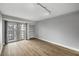 Spacious living room with hardwood floors, and a large window for natural light at 199 14Th Ne St # 2407, Atlanta, GA 30309
