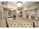 Grand lobby with marble floors, decorative columns, and elegant telephone room at 199 14Th Ne St # 2407, Atlanta, GA 30309