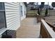 Lovely back porch overlooking the yard is great for relaxing and unwinding at 2100 Driftwood Cir, Cumming, GA 30041