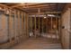 The basement includes framing in place for easy finishing or electrical updates at 2100 Driftwood Cir, Cumming, GA 30041