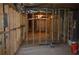 The basement includes framing in place for easy finishing or electrical updates at 2100 Driftwood Cir, Cumming, GA 30041