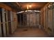 The basement includes framing in place for easy finishing or electrical updates at 2100 Driftwood Cir, Cumming, GA 30041