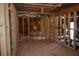The basement includes framing in place for easy finishing or electrical updates at 2100 Driftwood Cir, Cumming, GA 30041