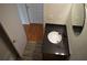 Bathroom features a granite countertop vanity with tile flooring and a modern faucet at 2100 Driftwood Cir, Cumming, GA 30041