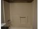 Bathroom features a bathtub-shower combo and granite countertop at 2100 Driftwood Cir, Cumming, GA 30041