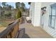 Inviting front porch with seating area perfect for enjoying the outdoors at 2100 Driftwood Cir, Cumming, GA 30041