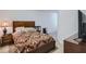 Cozy bedroom with a warm ambiance featuring a wooden bed frame and matching nightstands at 5036 Longview Walk, Decatur, GA 30035