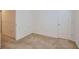 Simple bedroom with neutral carpet, white walls, and a closet at 5036 Longview Walk, Decatur, GA 30035