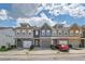 Attractive townhome complex showcasing varied exterior colors and two-car garages at 5036 Longview Walk, Decatur, GA 30035