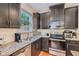 Well-equipped kitchen showcasing granite counters, stainless appliances, and ample cabinetry at 5036 Longview Walk, Decatur, GA 30035