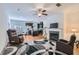 Open-concept living area featuring hardwood floors, fireplace, and connection to the kitchen at 5036 Longview Walk, Decatur, GA 30035