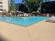 Inviting community pool with comfortable lounge chairs, perfect for relaxation and recreation at 878 Peachtree Ne St # 608, Atlanta, GA 30309