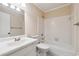 Bathroom featuring a shower-tub combo, single sink vanity, and neutral paint at 220 Mimosa Dr, Fayetteville, GA 30214