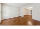 Dining room with hardwood floors and view to chandelier in next room at 220 Mimosa Dr, Fayetteville, GA 30214