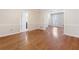 Large living room featuring hardwood floors and views through an open doorway at 220 Mimosa Dr, Fayetteville, GA 30214