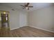 Bedroom featuring a closet, ceiling fan, and doorway to other parts of home at 2398 Lawrenceville Hwy # K, Decatur, GA 30033