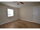 Bedroom featuring a window to let in natural light, ceiling fan, and closet at 2398 Lawrenceville Hwy # K, Decatur, GA 30033