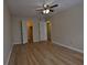 Bedroom featuring ceiling fan and access to closet storage at 2398 Lawrenceville Hwy # K, Decatur, GA 30033
