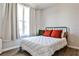 Cozy bedroom with a comfortable bed, soft lighting, and a view from the window at 108 Fieldbrook Xing, Holly Springs, GA 30115