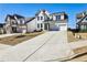 Charming new construction featuring a long driveway and lots of natural light at 108 Fieldbrook Xing, Holly Springs, GA 30115