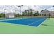 Well-maintained community tennis courts, ideal for friendly matches and active recreation at 108 Fieldbrook Xing, Holly Springs, GA 30115