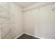Walk-in closet featuring wire shelving and neutral paint at 1559 Hillary Cove Ct, Lawrenceville, GA 30043