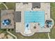 An aerial view of the large community pool, playground, and seating with ample space for everyone at 145 Meadow Branch Ln, Dallas, GA 30157