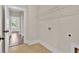 Laundry Room featuring laundry hookups, shelving, and hardwood floors at 145 Meadow Branch Ln, Dallas, GA 30157